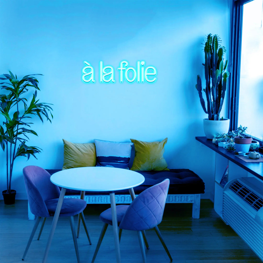 Watch the À la Folie Neon Sign light up, filling your space with a romantic and energetic ambiance.