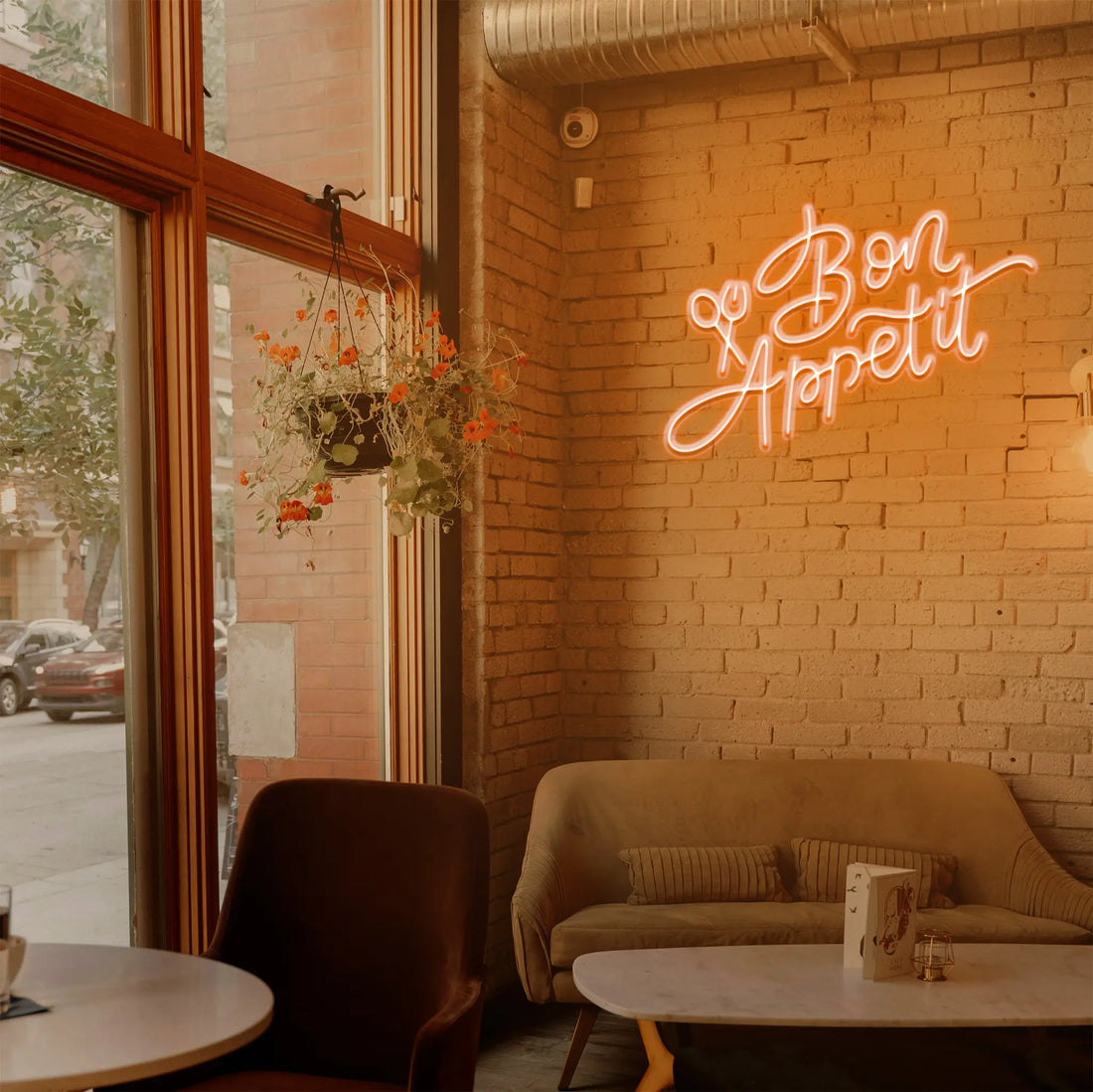 Bon Appétit Neon Light placed in a cozy dining room, creating a welcoming and charming atmosphere.