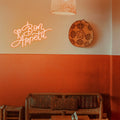 Bon Appétit Neon Light placed in a cozy dining room, creating a welcoming and charming atmosphere.