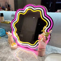 Front view of the Cosmic Glow Mirror with celestial design.
