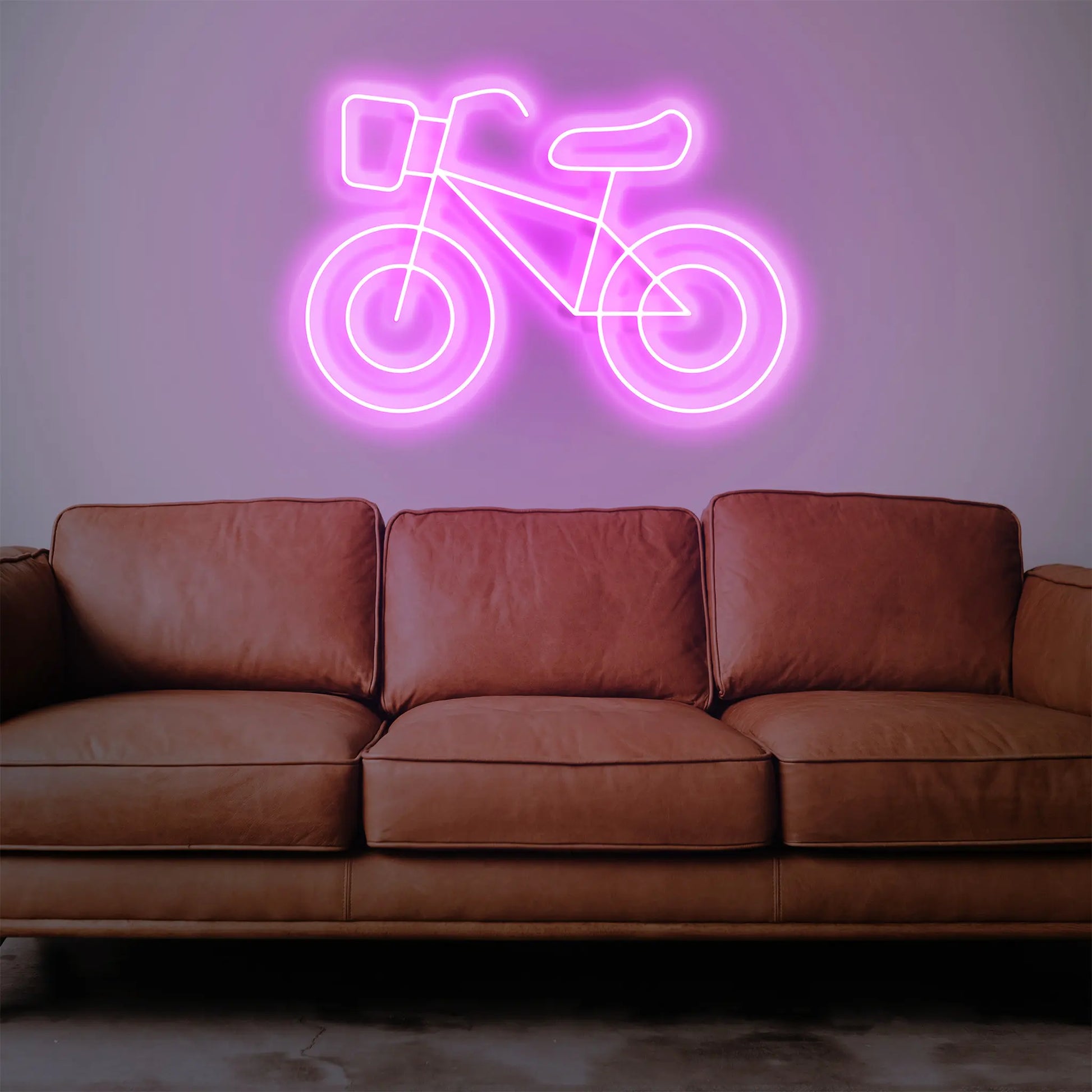 Glow Cycle Neon Light lit up with bright neon colors, bringing a sense of action and excitement to any room.