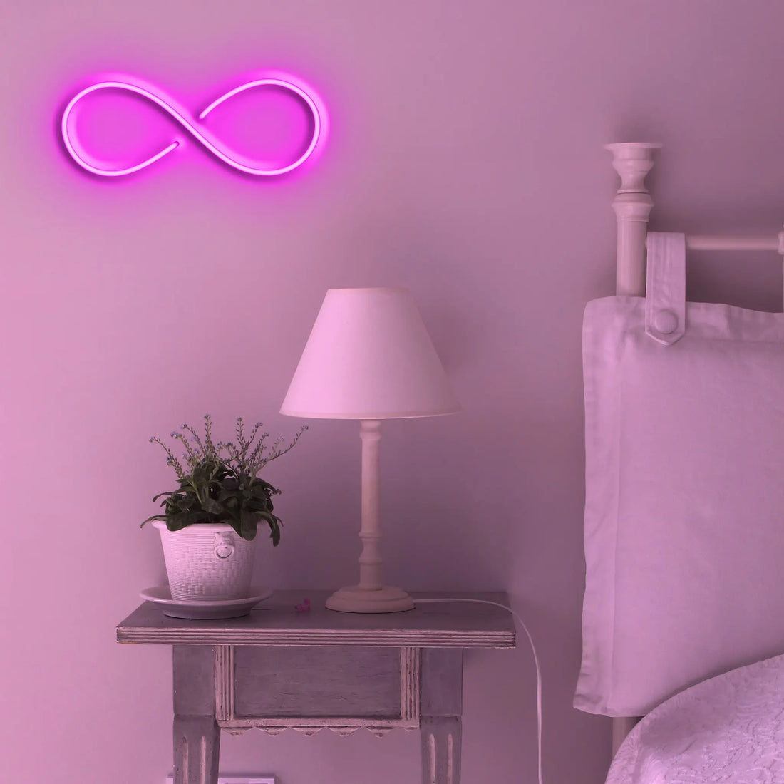 Infinity Neon Light illuminating a modern living room, adding a touch of sophistication and elegance.