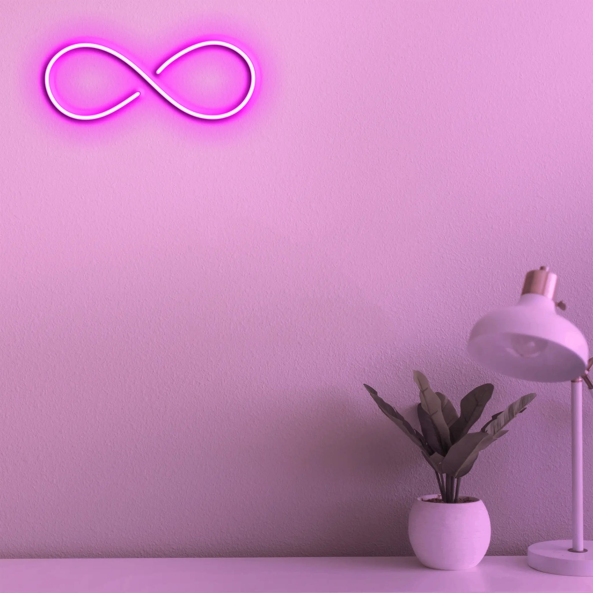 Close-up view of the Infinity Neon Light, featuring a sleek design that symbolizes infinity in bold neon lights.