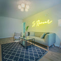 Close-up of the Le Rêveur Neon Light, softly glowing in elegant neon colors, adding inspiration to any creative space.