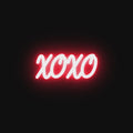 Watch the XOXO neon sign illuminate in vibrant colors, enhancing the mood of any room with its bold and romantic glow.