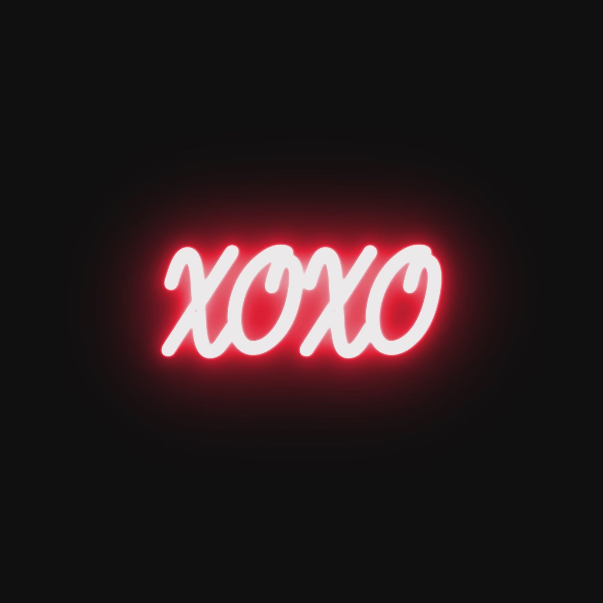 Watch the XOXO neon sign illuminate in vibrant colors, enhancing the mood of any room with its bold and romantic glow.